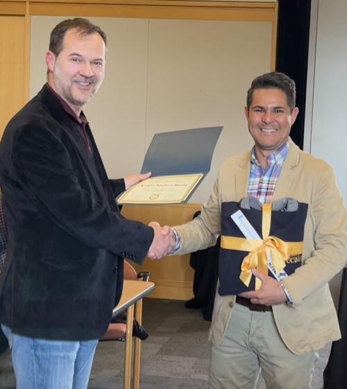 Andres Navarro Munoz receives certificate